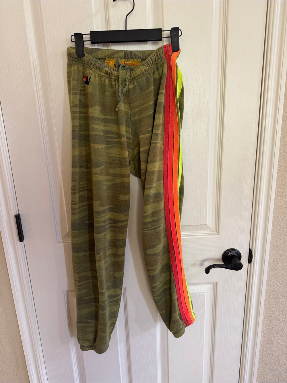 Aviator Nation sweatpants. Green camouflage with neon stripes. Size small.